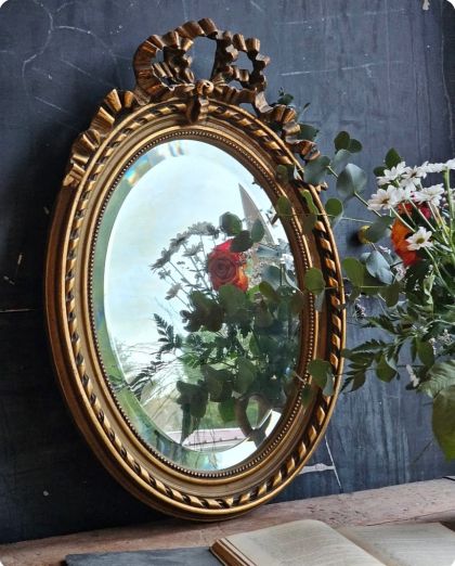 Ancien miroir ovale biseauté style Louis XVI